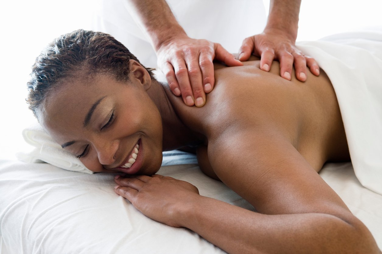 Woman having back massage